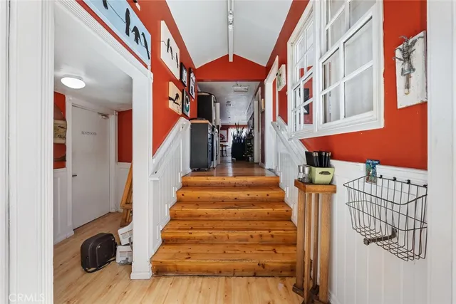 a kitchen with stainless steel appliances granite countertop a sink and cabinets