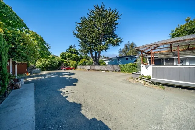 a backyard of a house with seating space