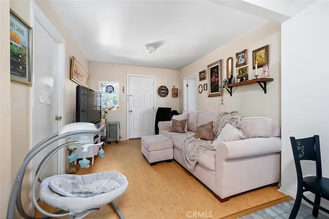 a kitchen with cabinets stainless steel appliances and a counter space