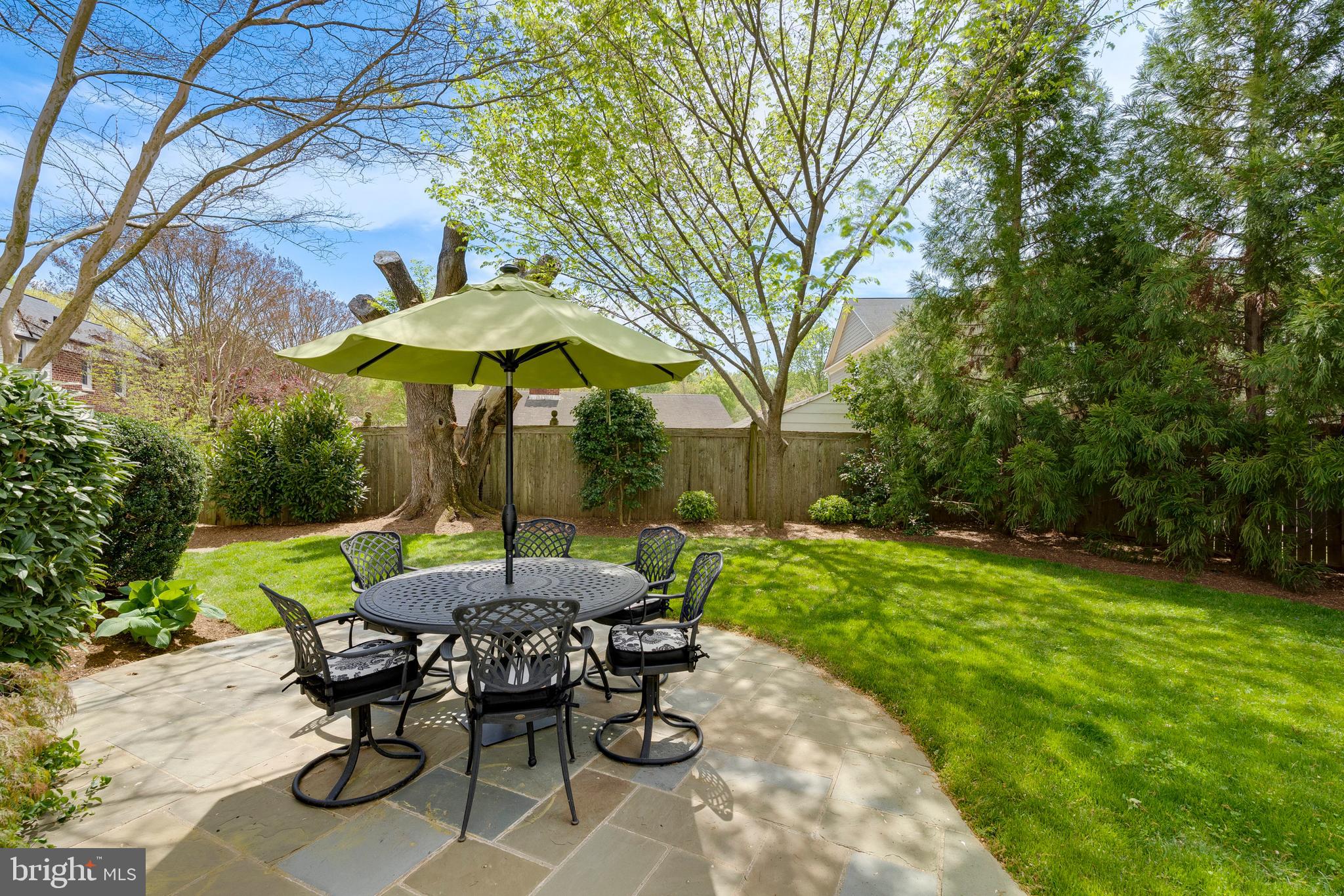 8502 Rayburn Road Bethesda, MD 20817 - Photo 44 of 49 a view of backyard with seating and green space