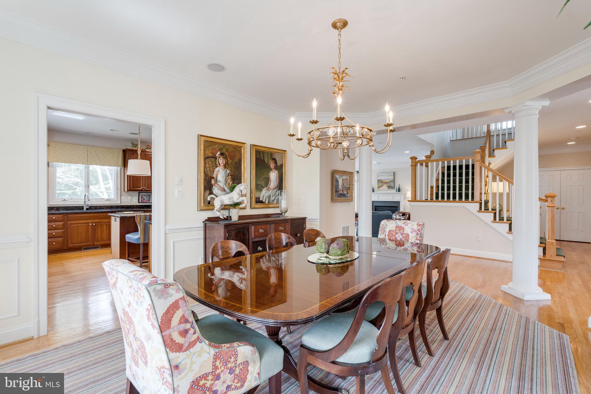 8502 Rayburn Road Bethesda, MD 20817 - Photo 8 of 49 a view of a dining room with furniture and wooden floor