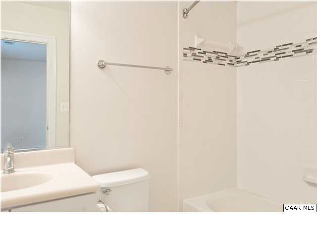 2128 Avinity Loop Charlottesville, VA 22902 - Photo 21 of 28 a bathroom with a sink and a mirror