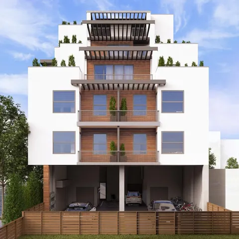 a front view of a building with glass windows