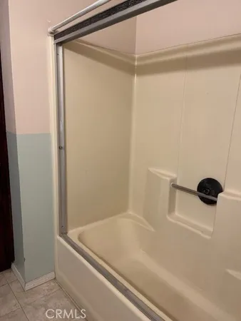 a view of a street with a house