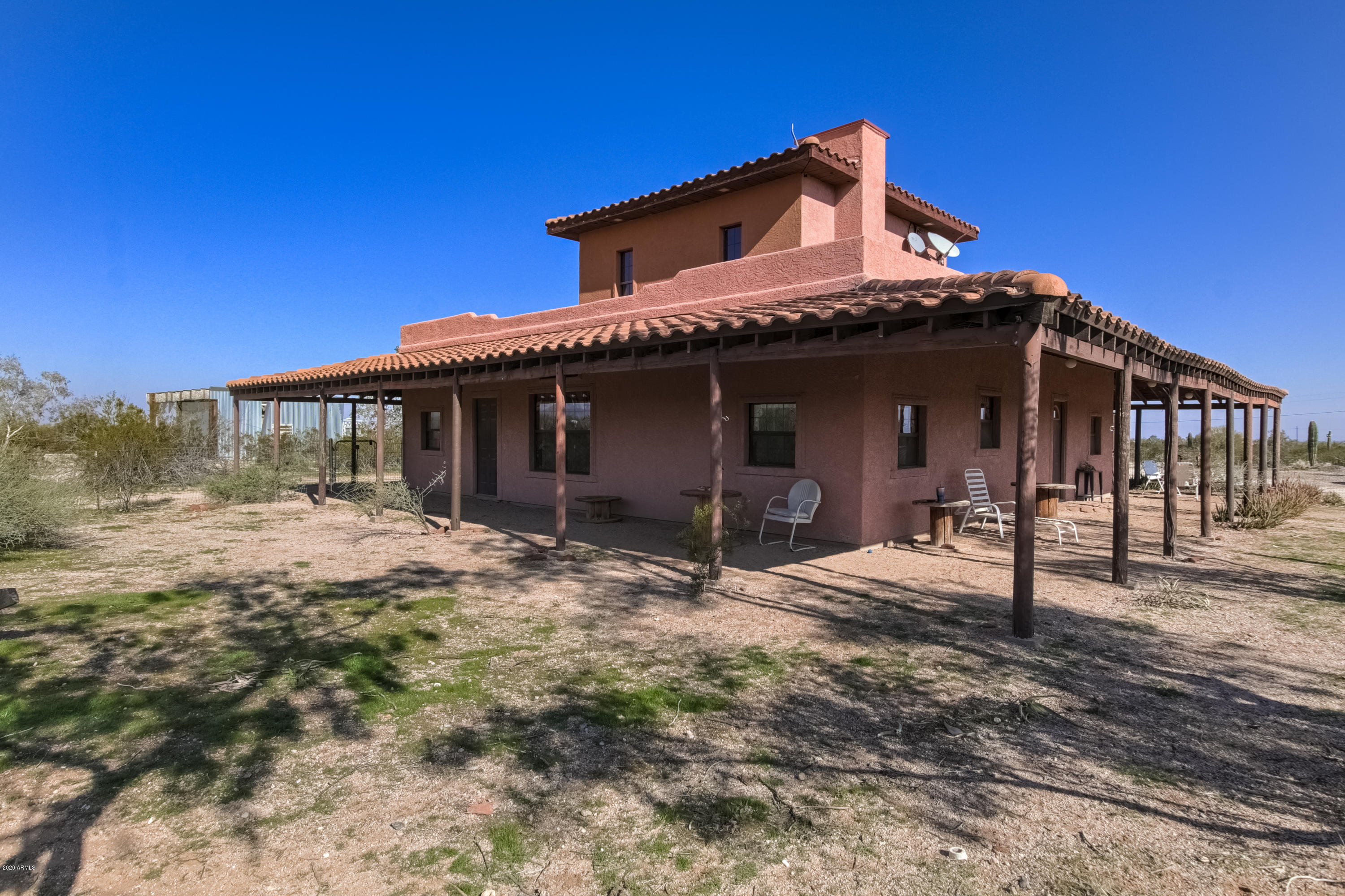 667 South Opal Road Maricopa, AZ 85139 - Photo 1 of 42 a front view of a house with a porch