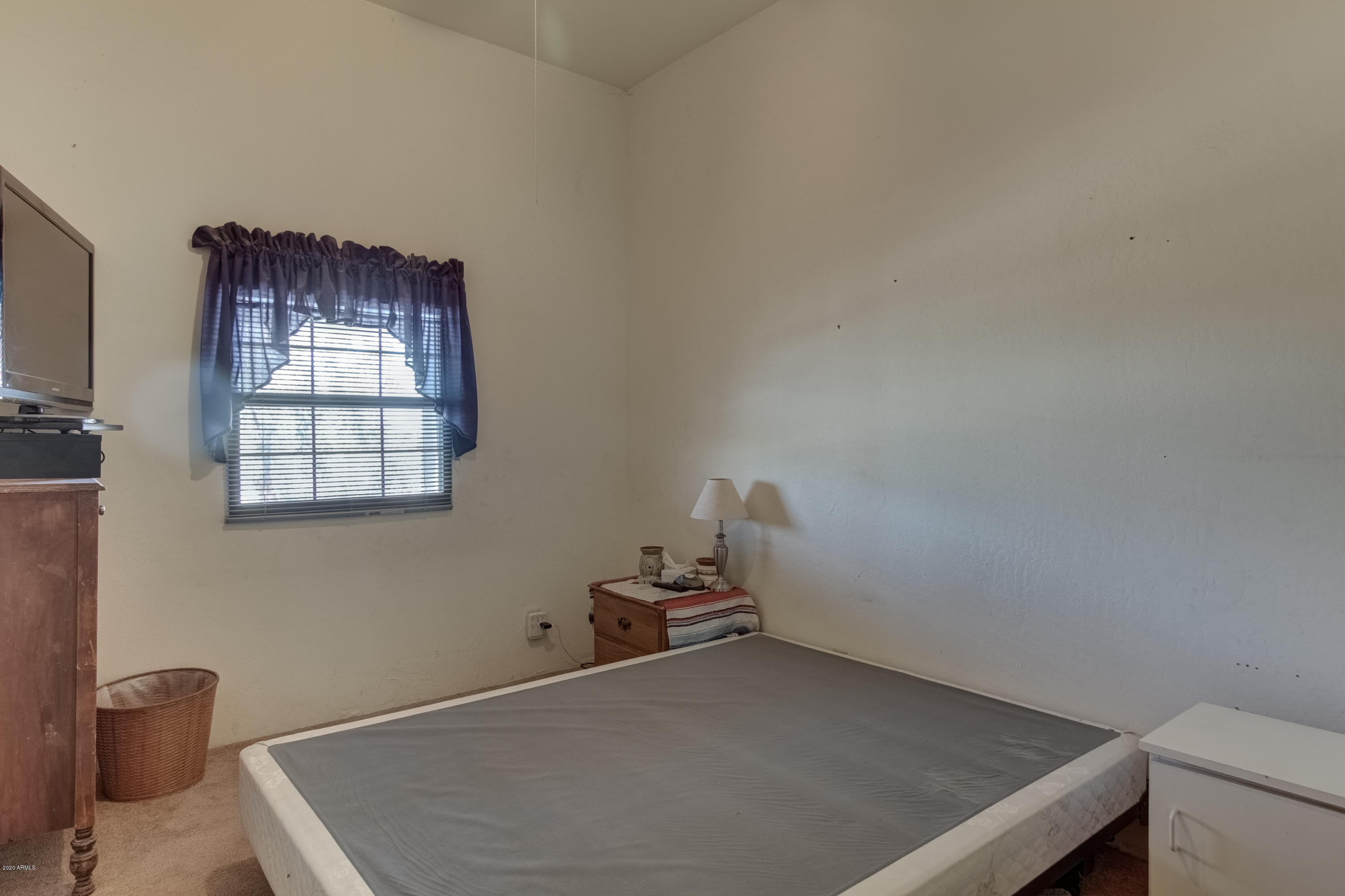 667 South Opal Road Maricopa, AZ 85139 - Photo 23 of 42 a room with a window