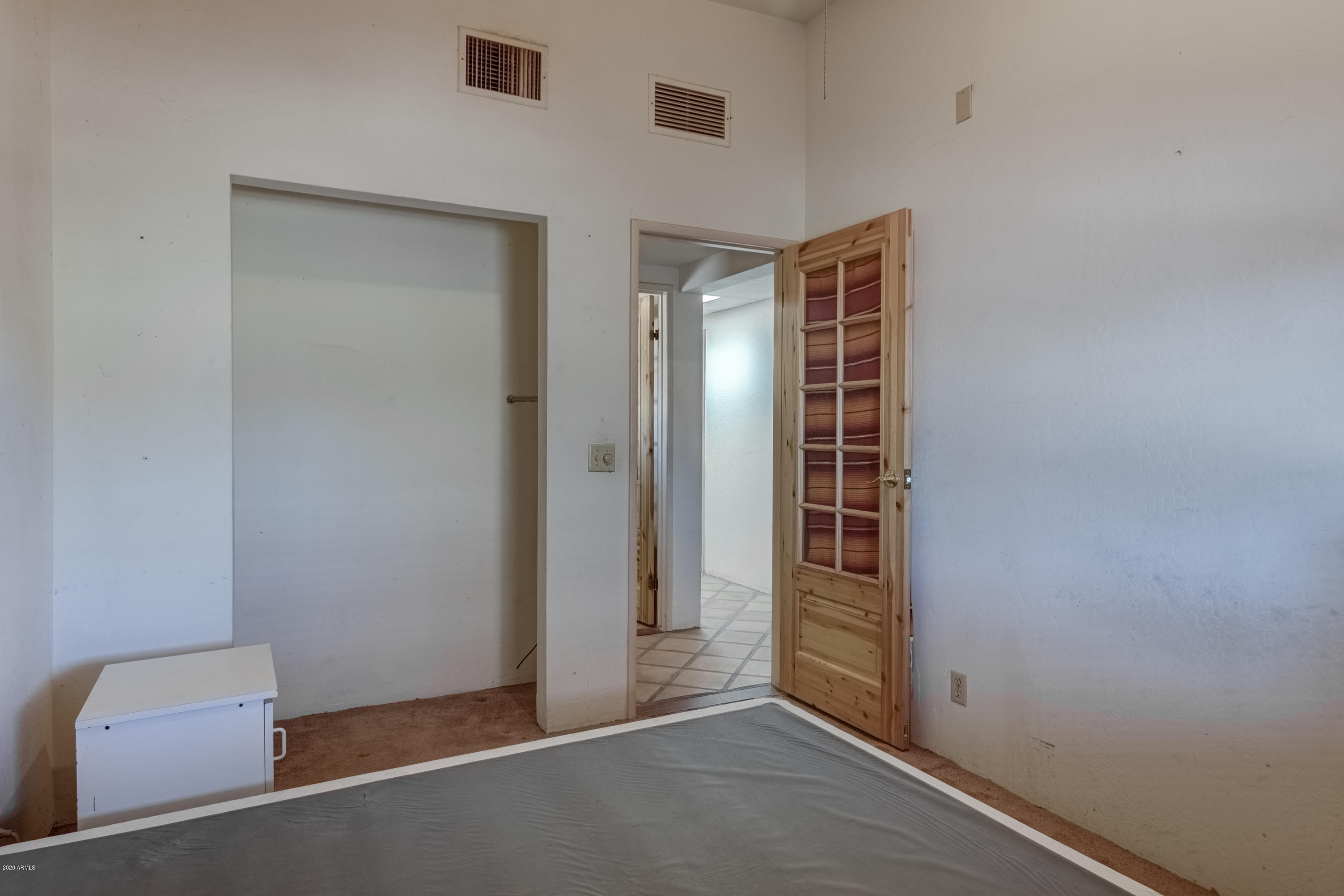 667 South Opal Road Maricopa, AZ 85139 - Photo 24 of 42 a view of an empty room with windows