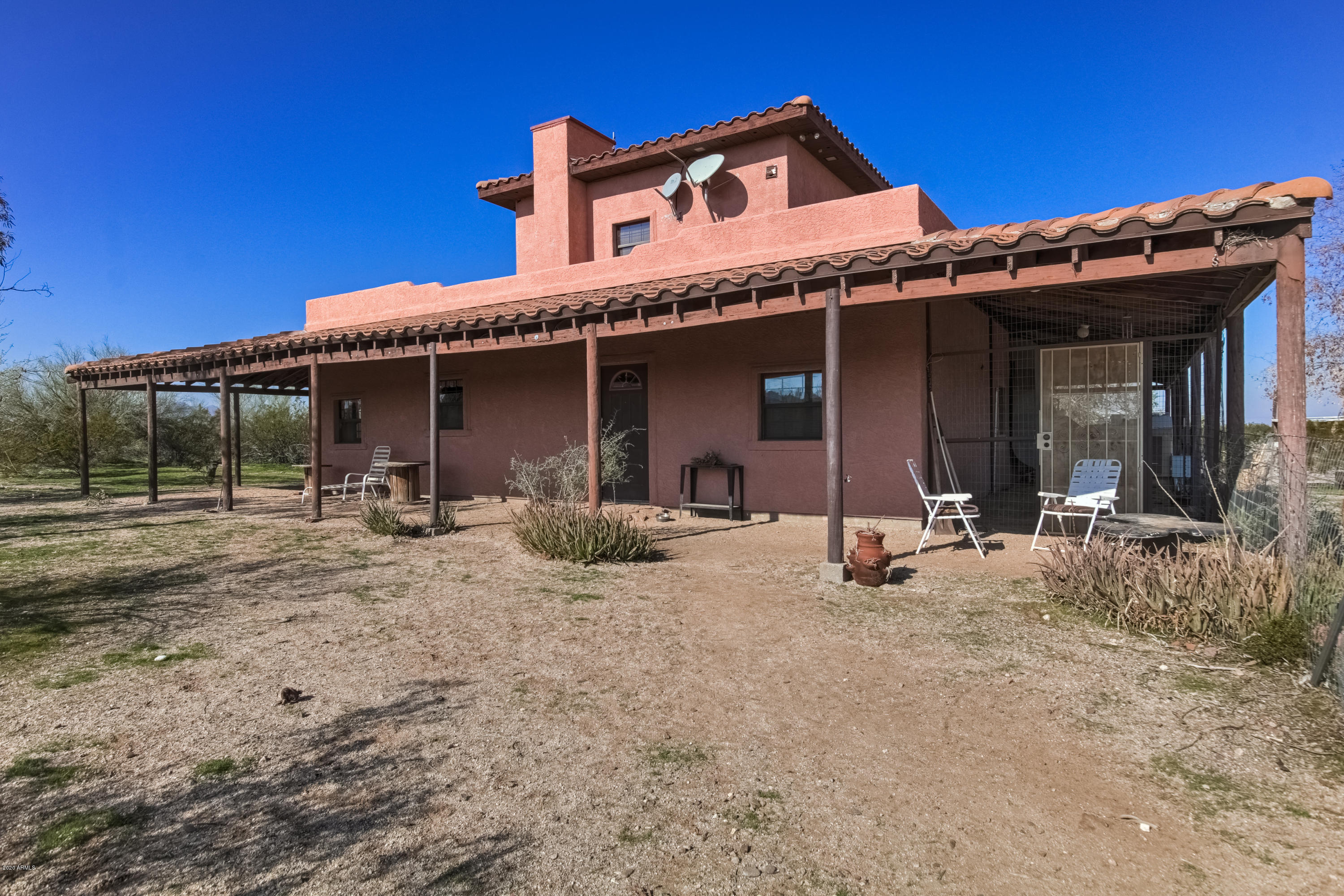 667 South Opal Road Maricopa, AZ 85139 - Photo 38 of 42 a view of a house with patio