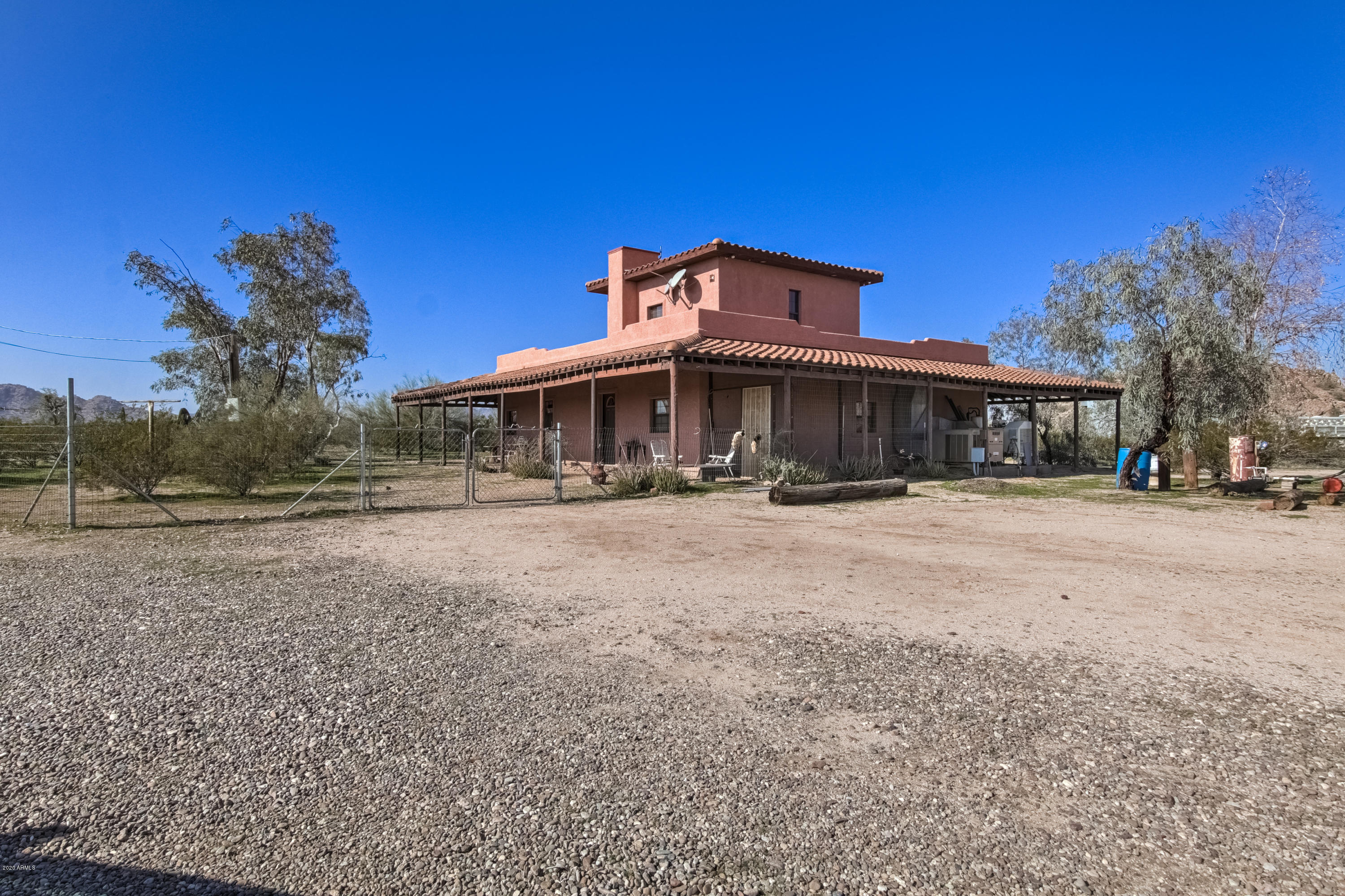 667 South Opal Road Maricopa, AZ 85139 - Photo 6 of 42 a view of a house with a yard
