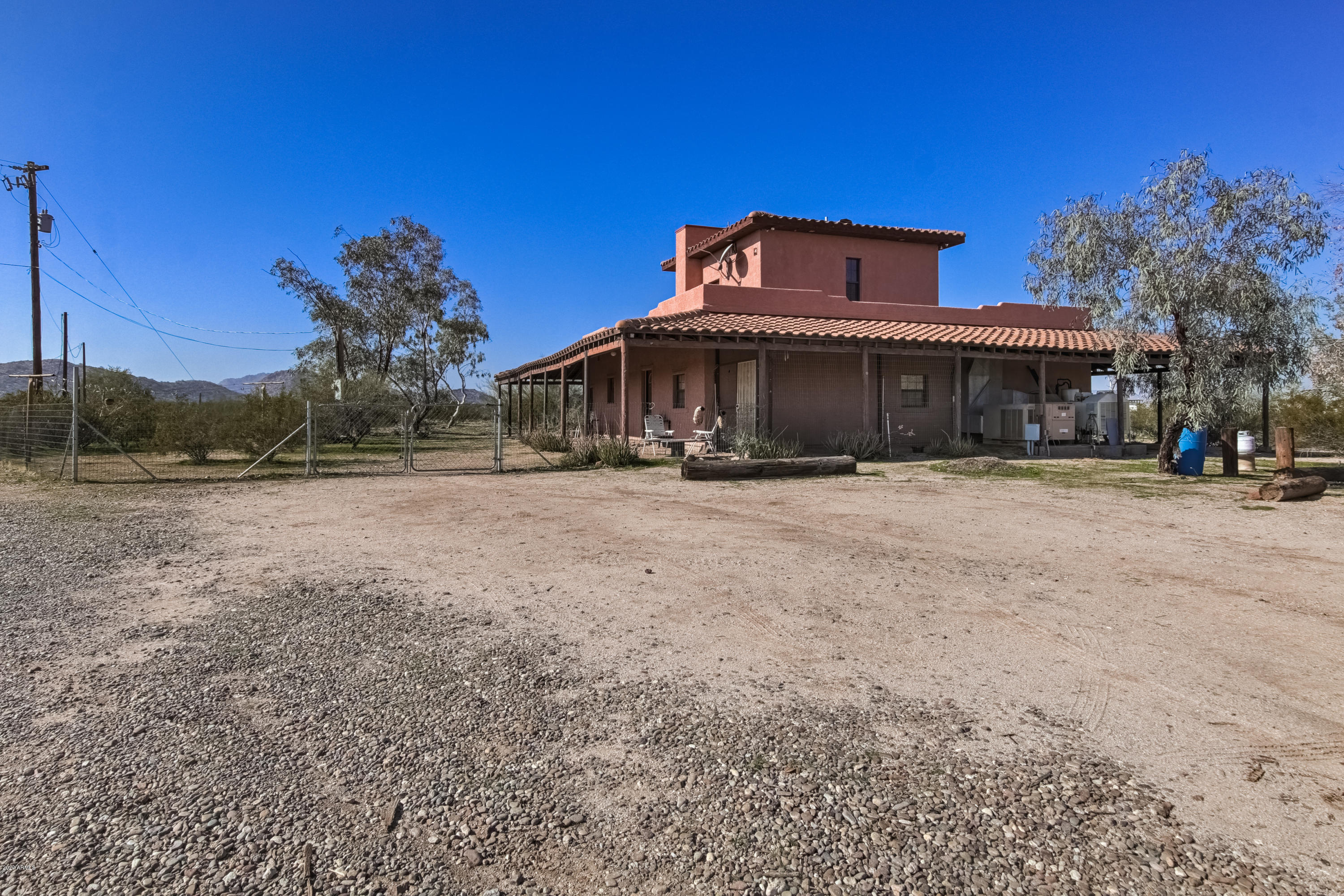 667 South Opal Road Maricopa, AZ 85139 - Photo 7 of 42 a front view of a house with a yard