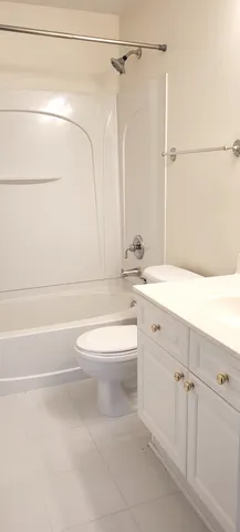 a view of storage and utility room with washer and dryer