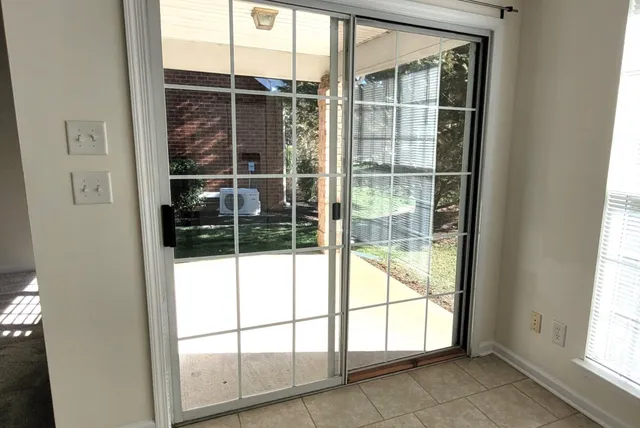 a view of a window and a door
