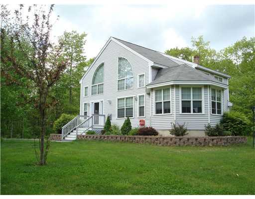 628 Deerwander Road Hollis Center, ME 04042 - Photo 2 of 25 Exterior Front. side image with sunroom