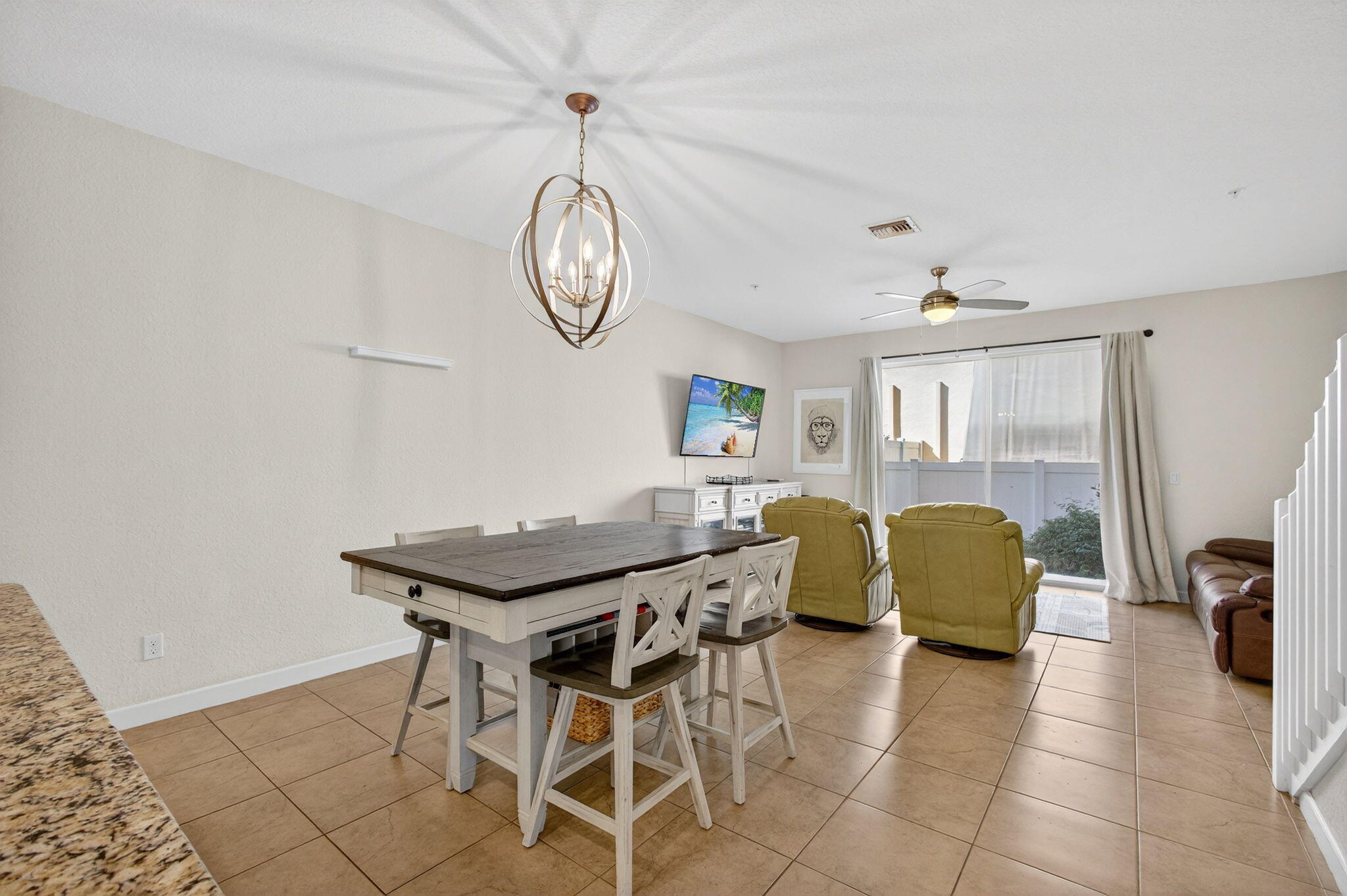 9440 Southwest Merlin Court Stuart, FL 34997 - Photo 11 of 54 a view of a livingroom with furniture and a window