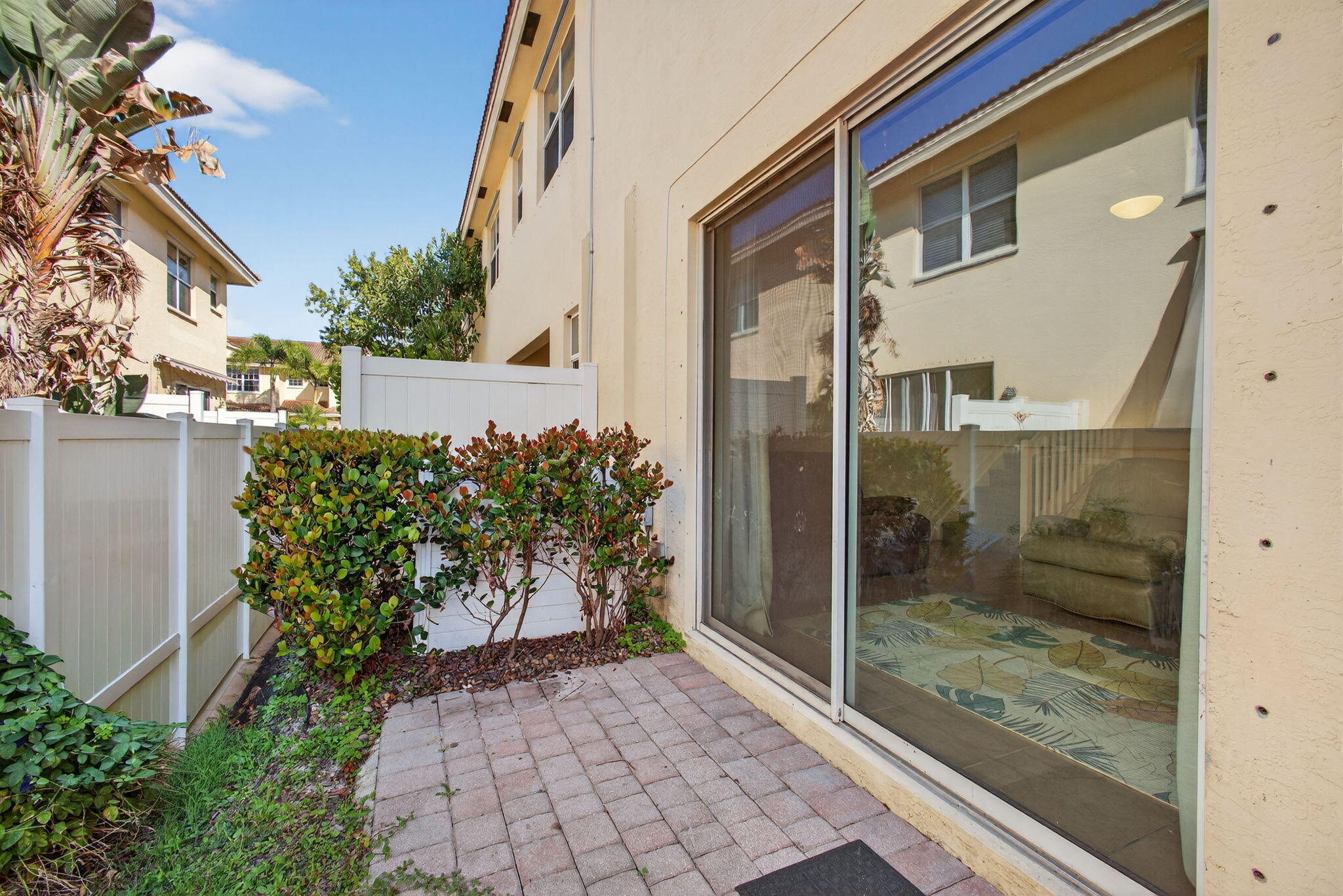 9440 Southwest Merlin Court Stuart, FL 34997 - Photo 22 of 54 a view of a balcony with a potted plant