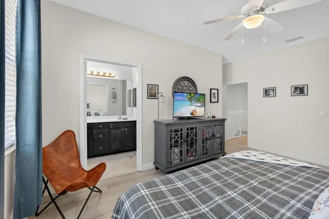 a bathroom with a sink double vanity and a mirror