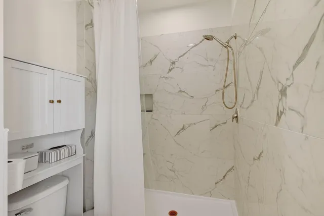 a bathroom with a double vanity sink a and mirror