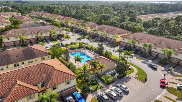 a view of outdoor space with signage and flags