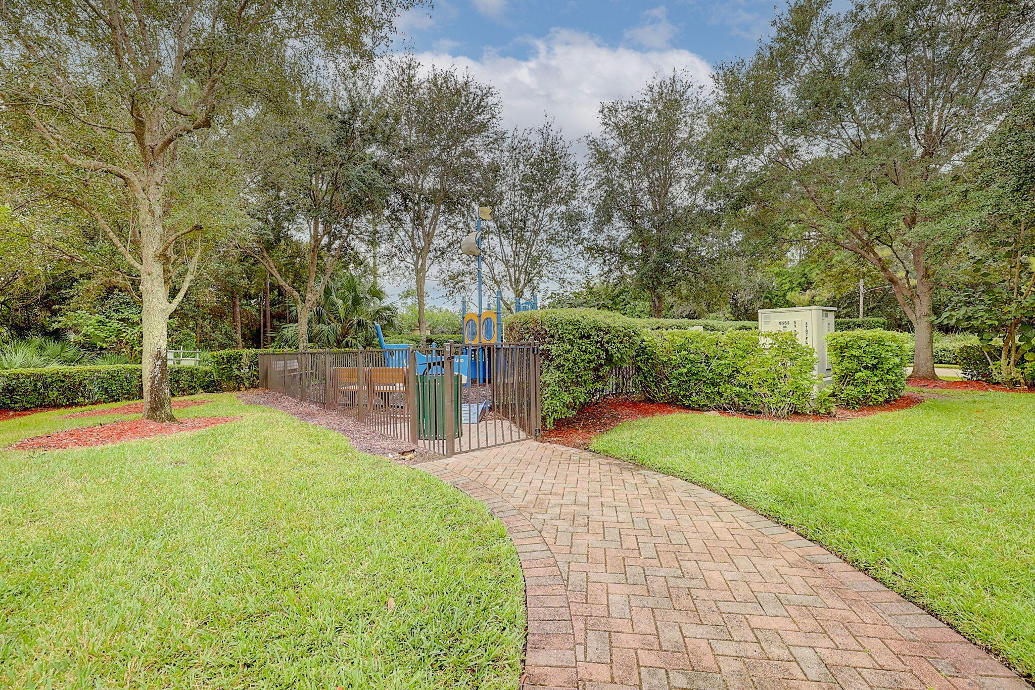 9440 Southwest Merlin Court Stuart, FL 34997 - Photo 53 of 54 a view of a backyard with swimming pool