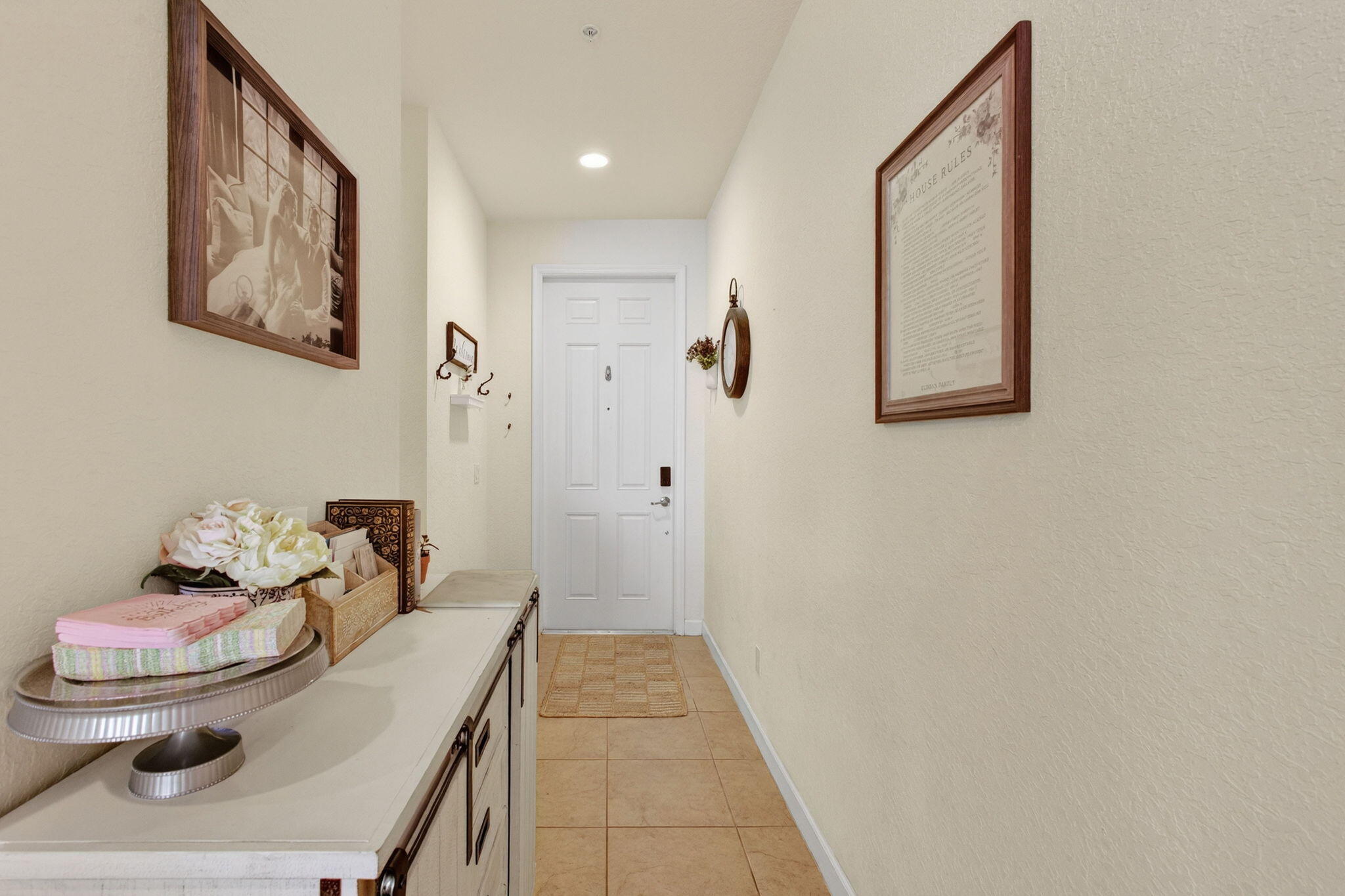 9440 Southwest Merlin Court Stuart, FL 34997 - Photo 6 of 54 a bathroom with a sink and a mirror