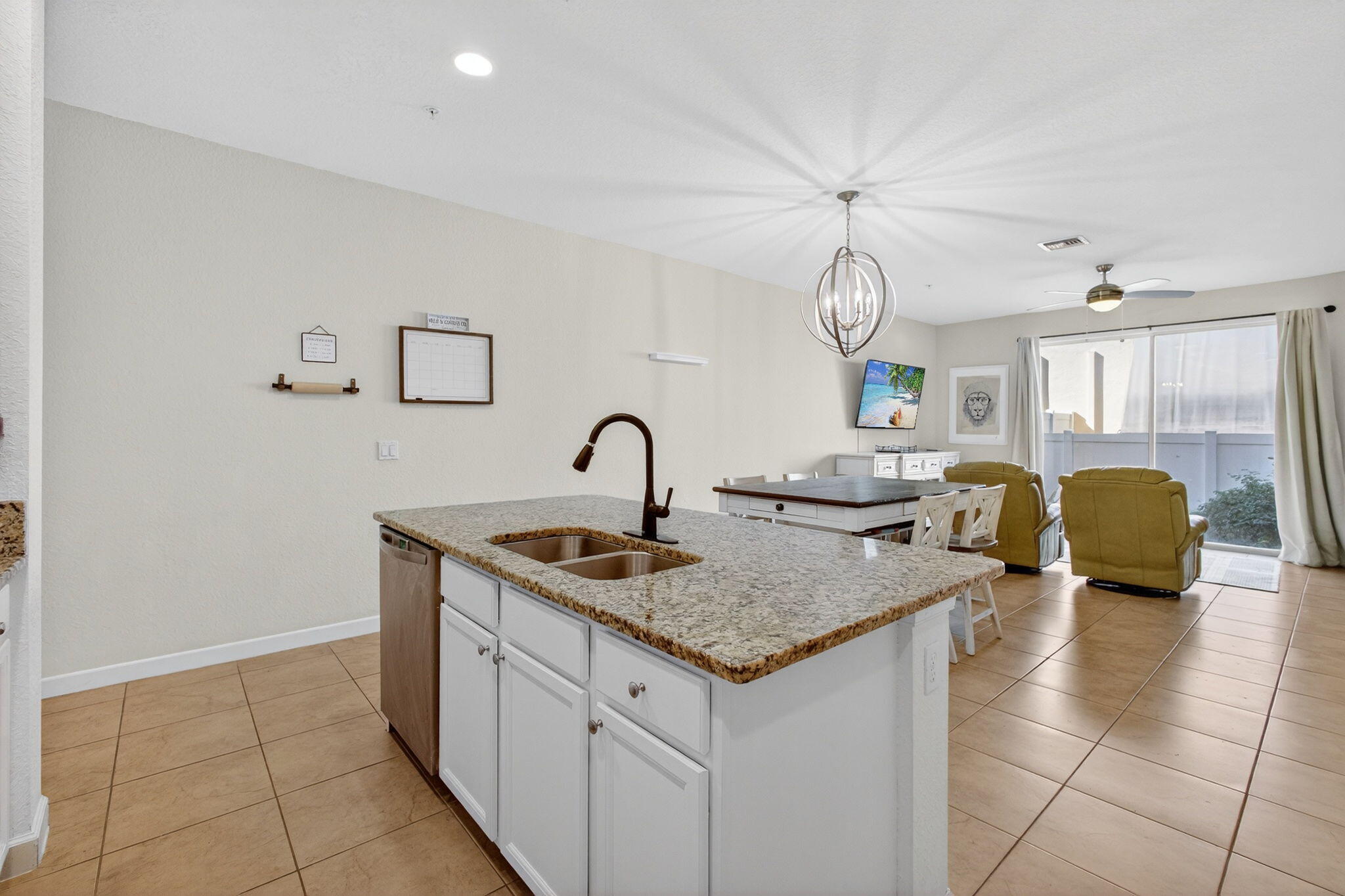 9440 Southwest Merlin Court Stuart, FL 34997 - Photo 10 of 54 a view of living room with granite countertop furniture