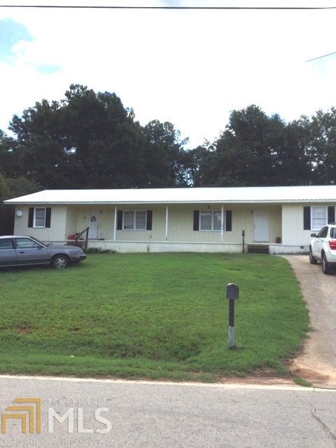 267 Jordan Road, Unit 269 Toccoa, GA 30577 - Photo 1 of 1 a front view of a house with a yard