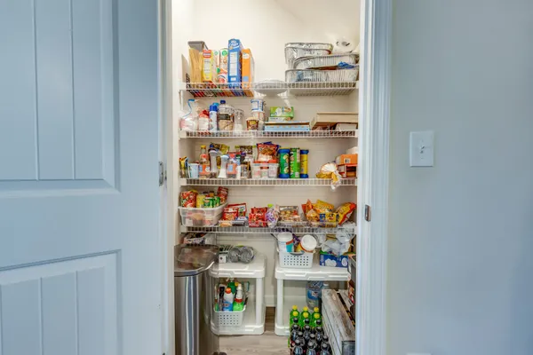 a view of storage and utility room with empty racks