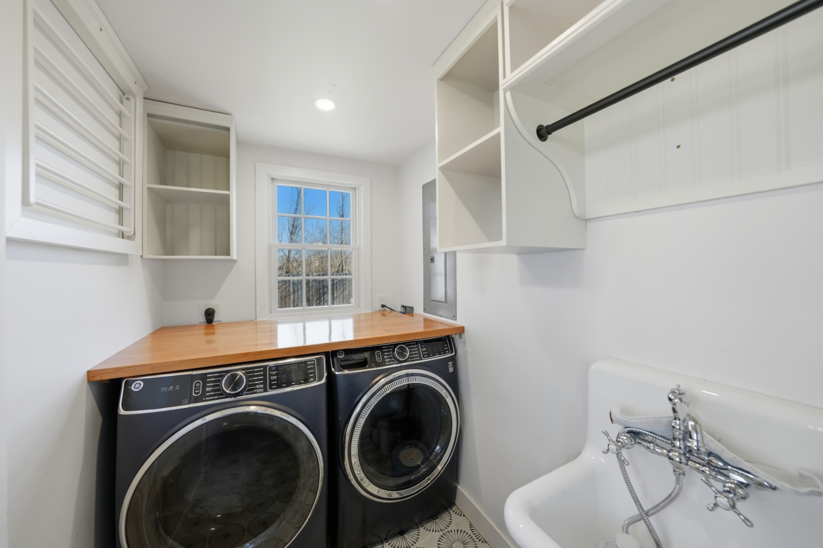 1 H Street Nantucket, MA 02554 - Photo 9 of 18 a utility room with sink dryer and washer