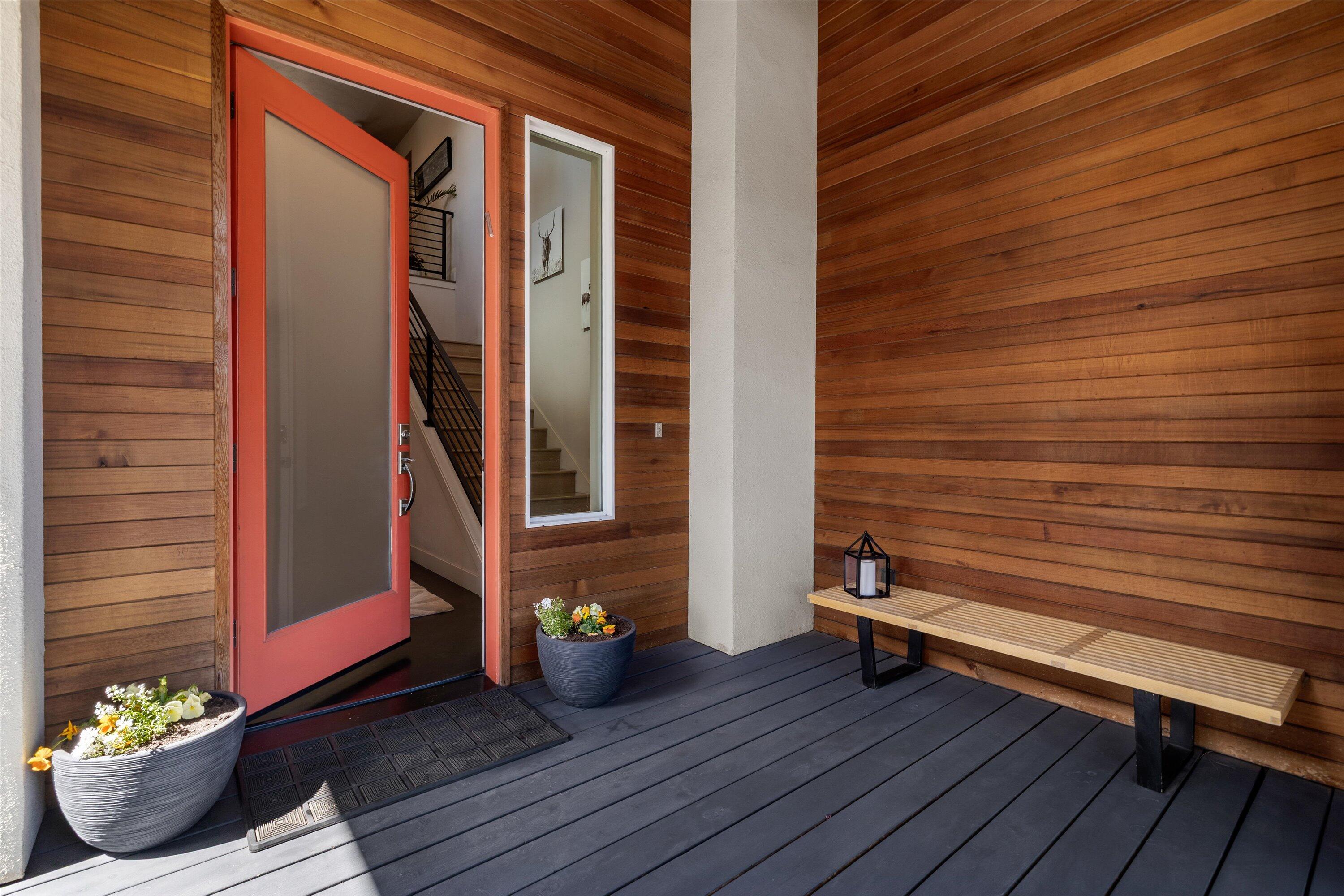 19504 Southwest Century Drive Bend, OR 97702 - Photo 5 of 58 a view of a balcony with chairs and wooden floor
