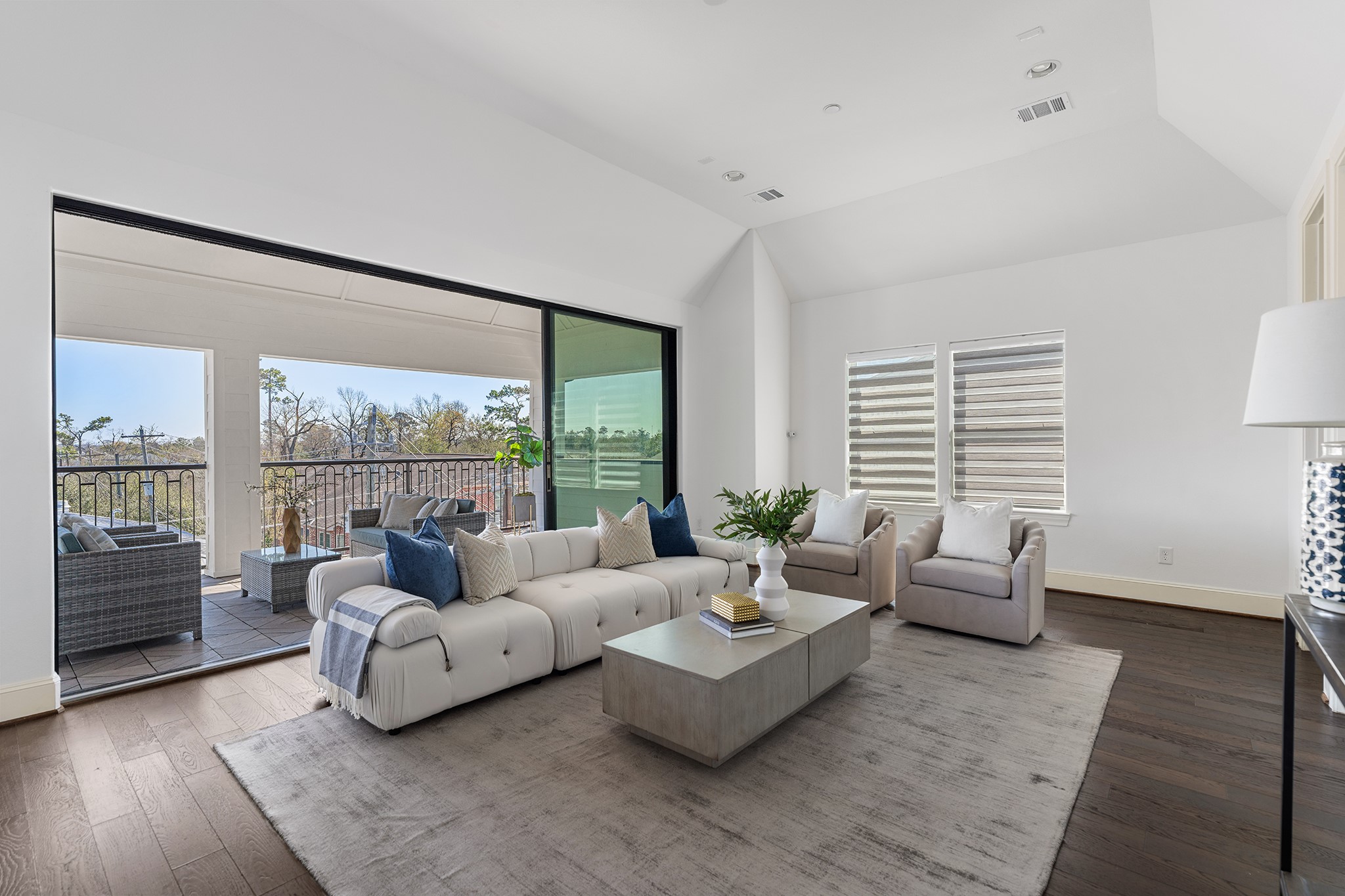 1314 Hunters Meadow Lane Houston, TX 77055 - Photo 13 of 37 Let your imagination go wild! This 4th floor retreat can be another living room or game room. The large sliding doors open to a huge balcony with scenic views, perfect for indoor/outdoor living.