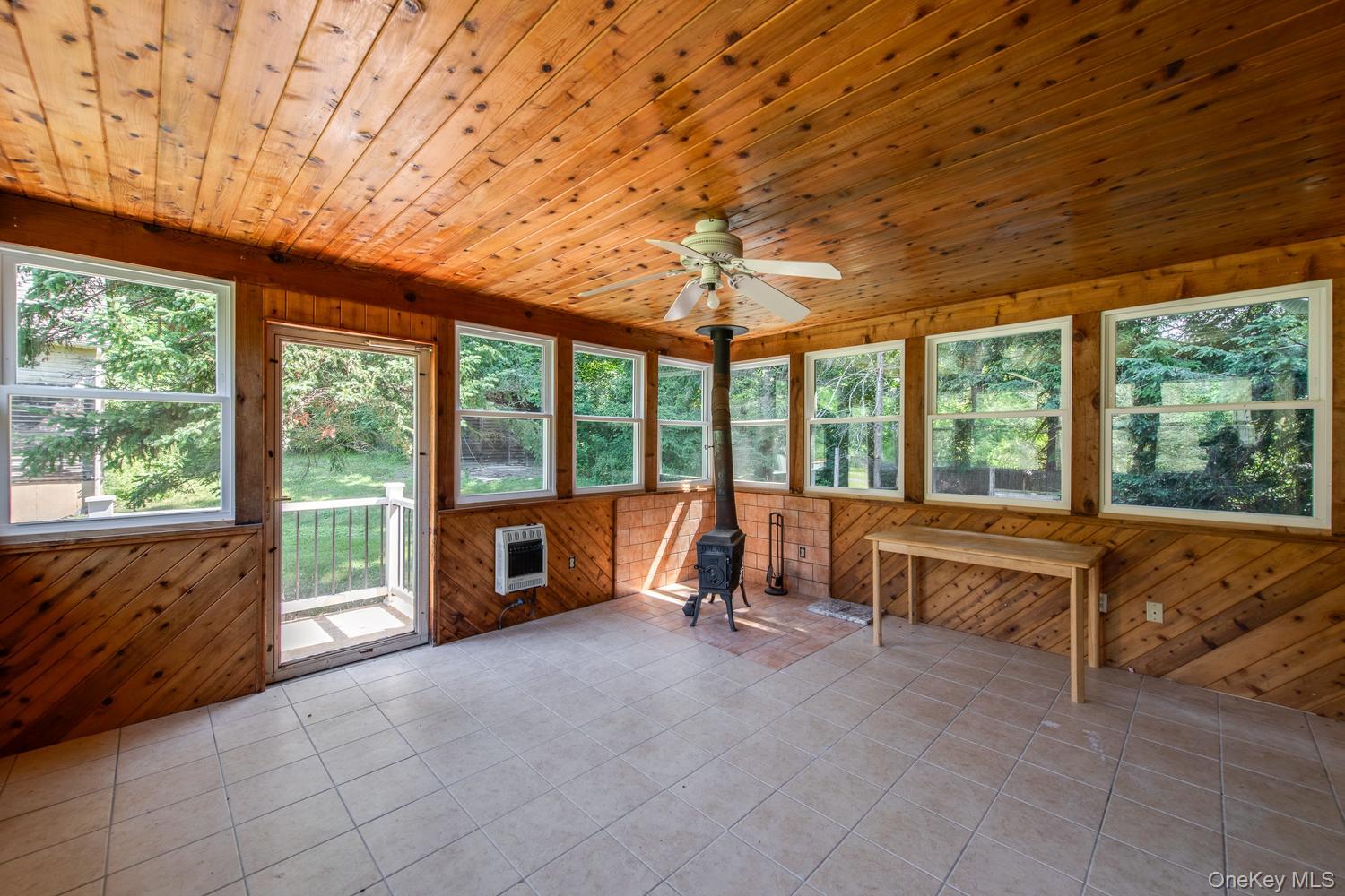 676-678 Oak Summit Road Millbrook, NY 12545 - Photo 13 of 38 Door to grill deck