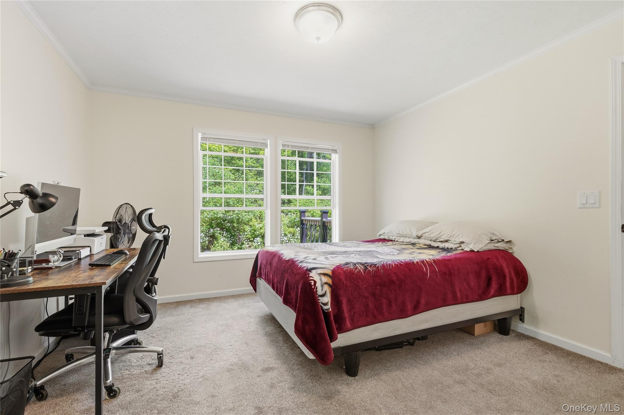 239-241 Fosler Road Highland, NY 12528 - Photo 35 of 42 Light-toned carpeted room featuring two large windows, white trim, and neutral wall paint