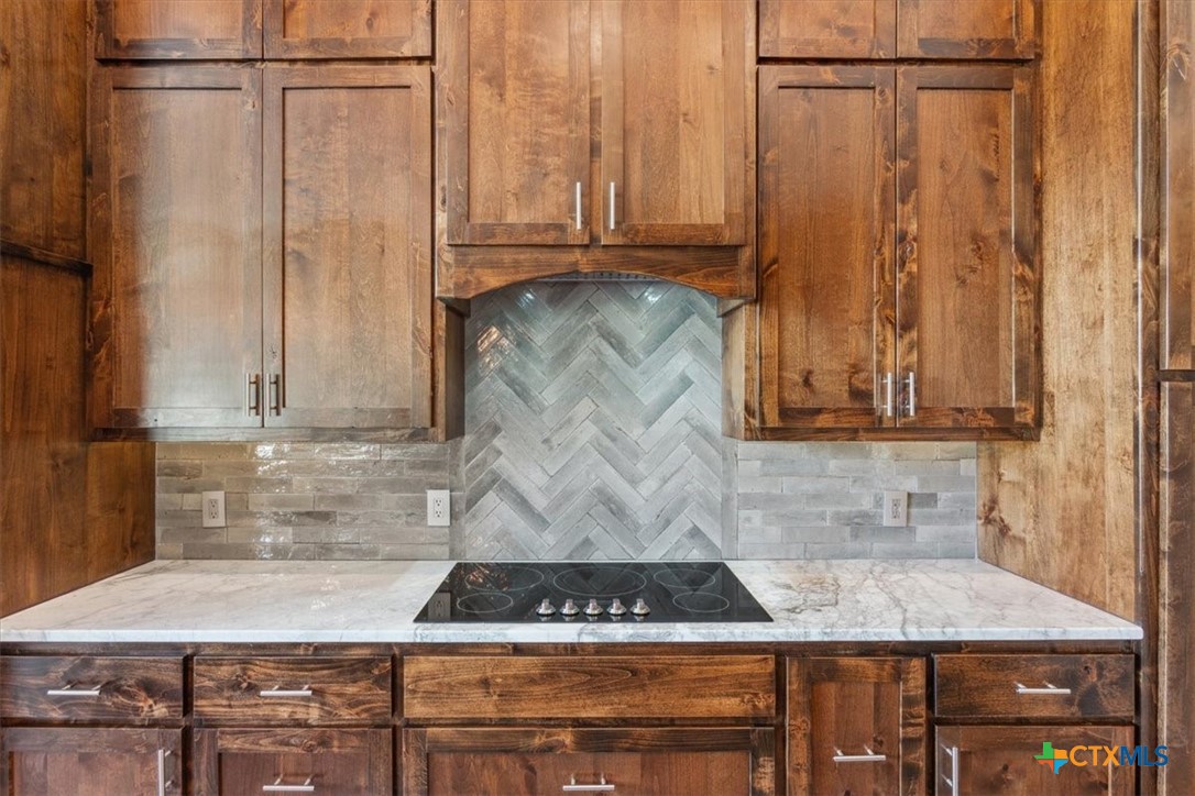 108 Scout Island Belton, TX 76513 - Photo 12 of 48 Custom Alder Wood Cabinetry