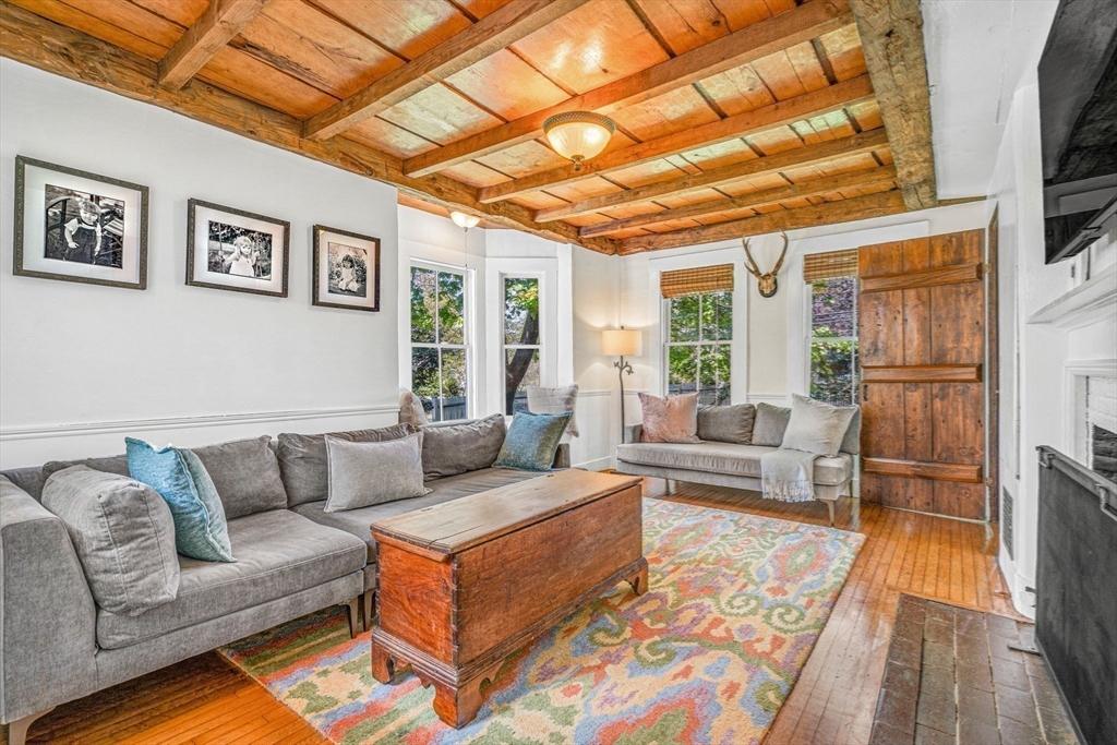 34 Everett Street Natick, MA 01760 - Photo 16 of 34 a living room with furniture and a rug