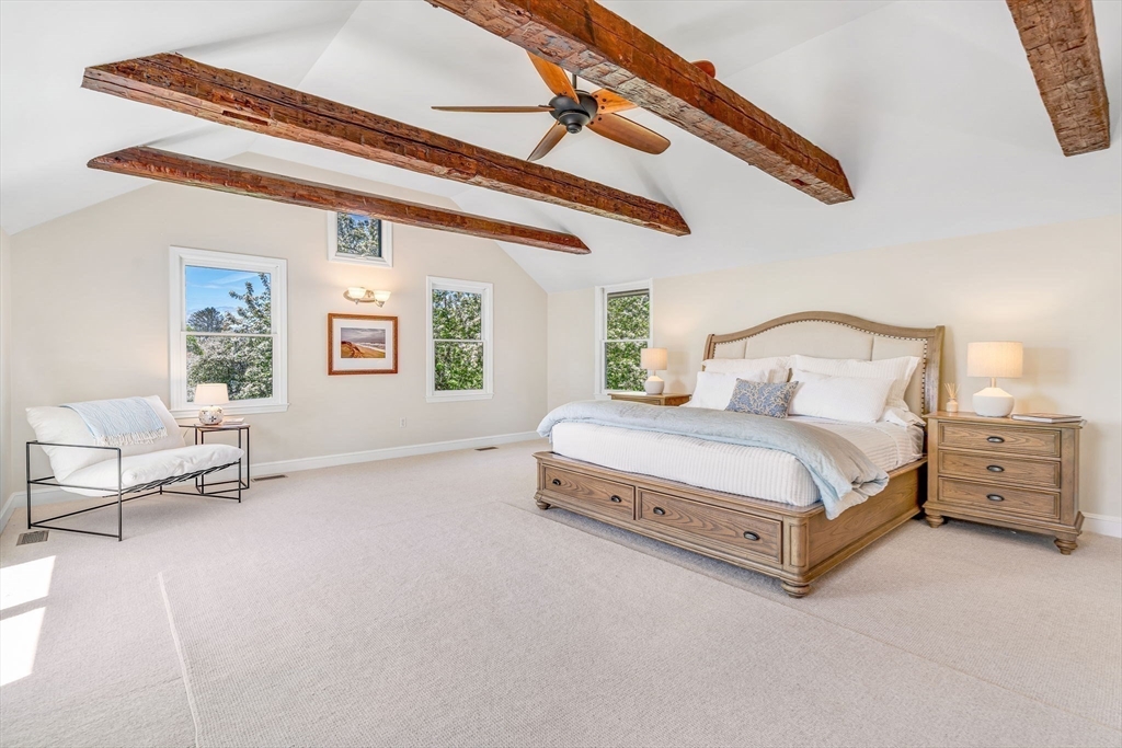 34 Everett Street Natick, MA 01760 - Photo 20 of 34 a bedroom with a bed and a couch