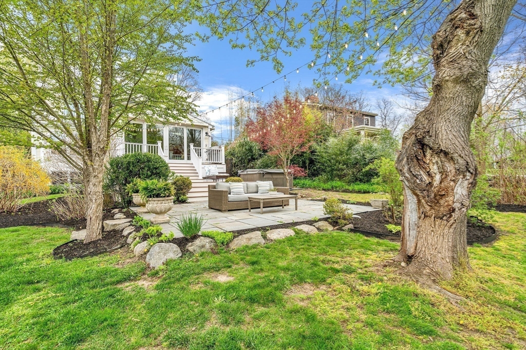 34 Everett Street Natick, MA 01760 - Photo 26 of 34 a view of a house with backyard and sitting area