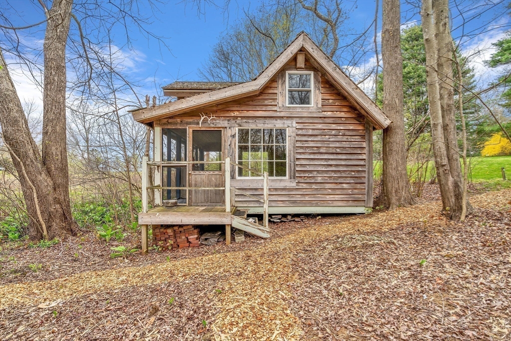 34 Everett Street Natick, MA 01760 - Photo 3 of 34 a front view of a house with a yard