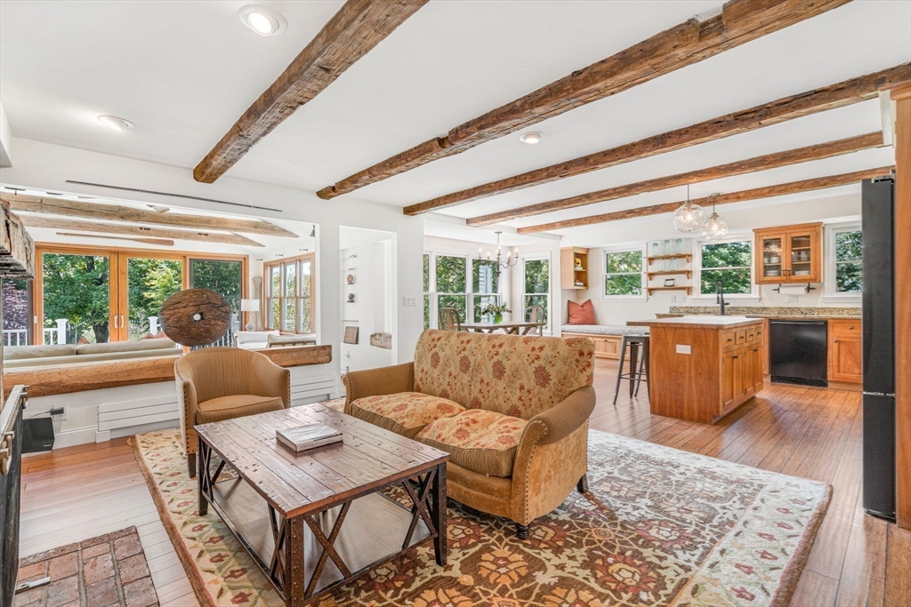 34 Everett Street Natick, MA 01760 - Photo 4 of 34 a living room with furniture and a large window