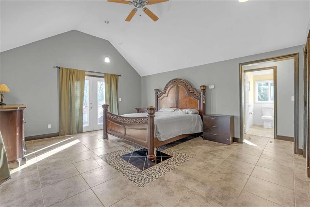 1256 Chambers Road McDonough, GA 30253 - Photo 18 of 49 a bedroom with a bed and a mirror