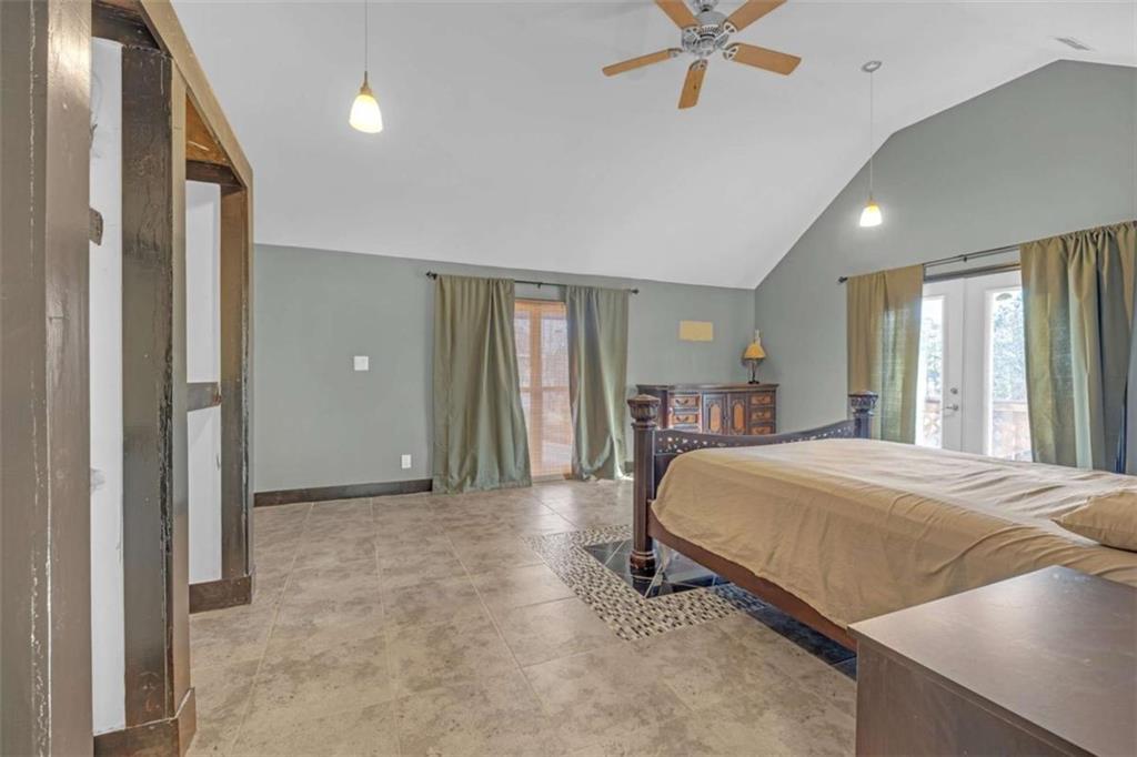 1256 Chambers Road McDonough, GA 30253 - Photo 20 of 49 a bed room with a bed and a large window