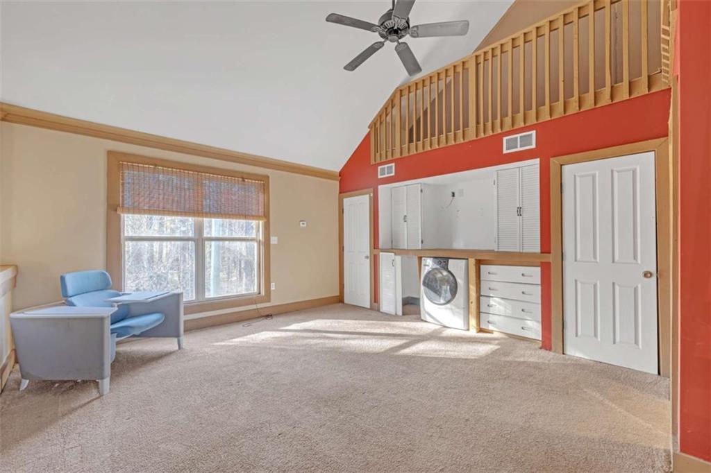 1256 Chambers Road McDonough, GA 30253 - Photo 25 of 49 a view of a livingroom with furniture and a window