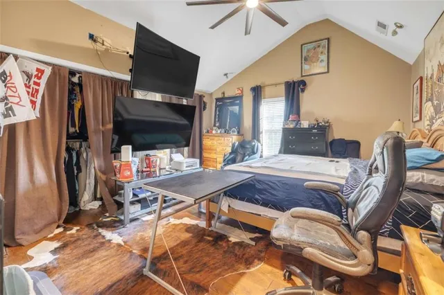 an aerial view of houses with yard