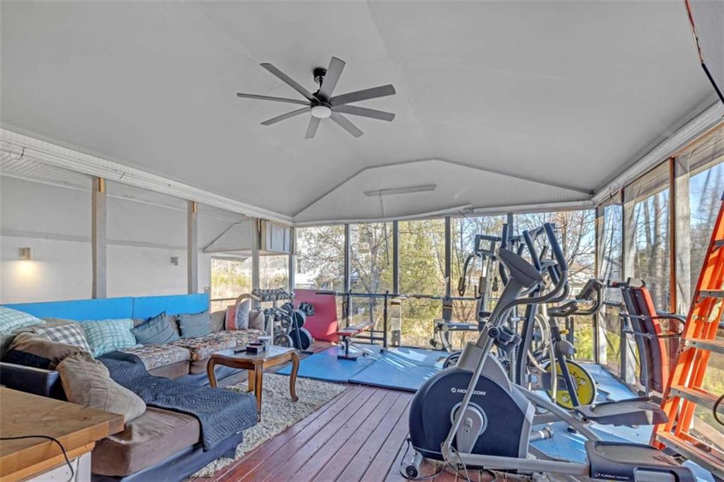 1256 Chambers Road McDonough, GA 30253 - Photo 39 of 49 a living room with furniture and a floor to ceiling window