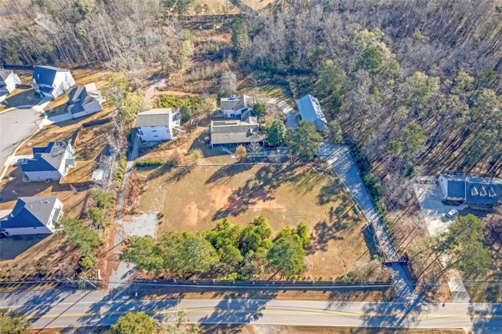 1256 Chambers Road McDonough, GA 30253 - Photo 41 of 49 an aerial view of residential houses with outdoor space