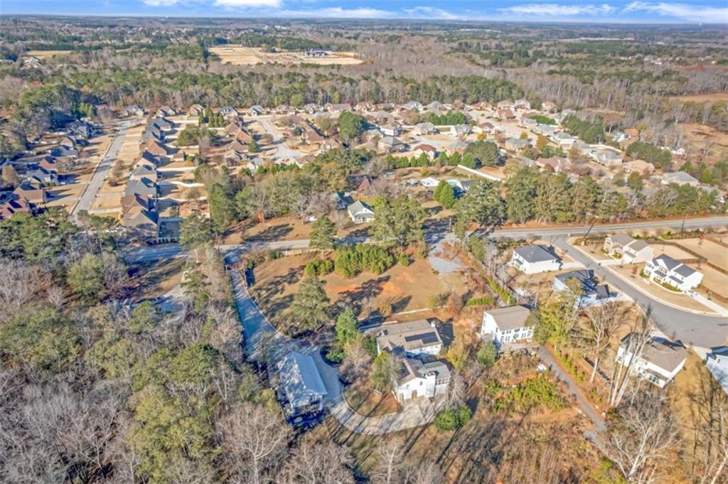1256 Chambers Road McDonough, GA 30253 - Photo 45 of 49 an aerial view of residential houses with outdoor space