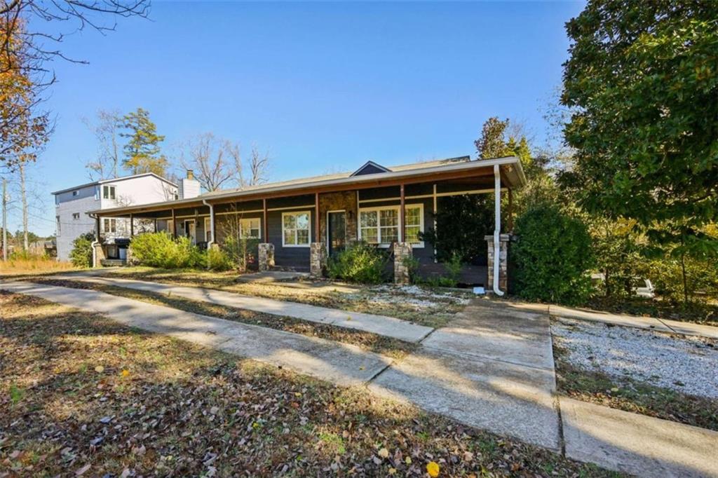 1256 Chambers Road McDonough, GA 30253 - Photo 46 of 49 a front view of a house with a yard