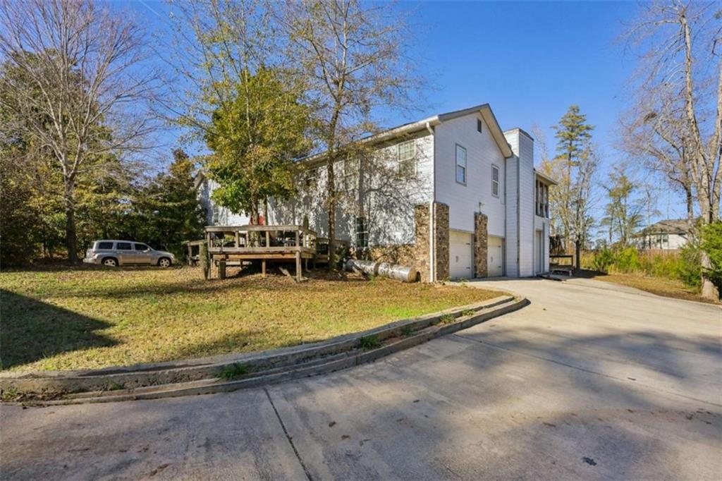 1256 Chambers Road McDonough, GA 30253 - Photo 7 of 49 a view of a house with a yard