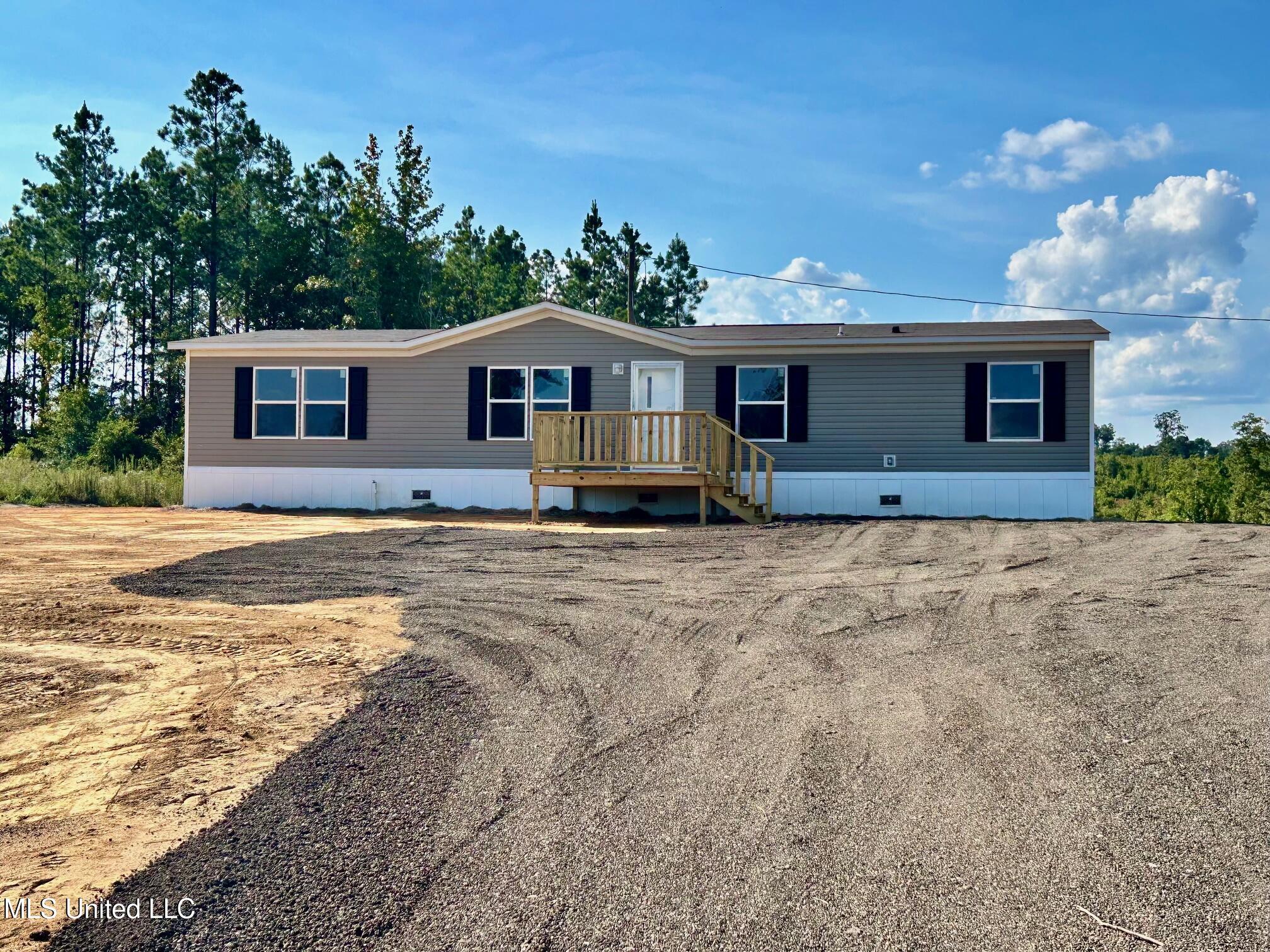 2460 Red Dog Road Carthage, MS 39051 - Photo 3 of 20 IMG_3109