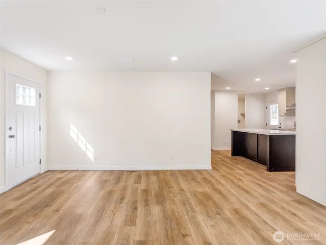 a view of kitchen with wooden floor