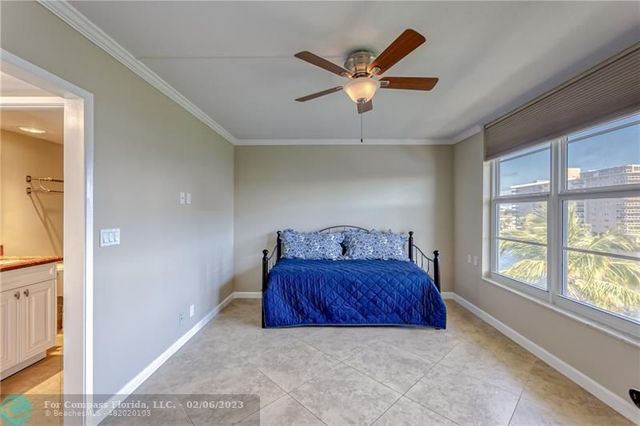 a bathroom with a shower a toilet and a sink